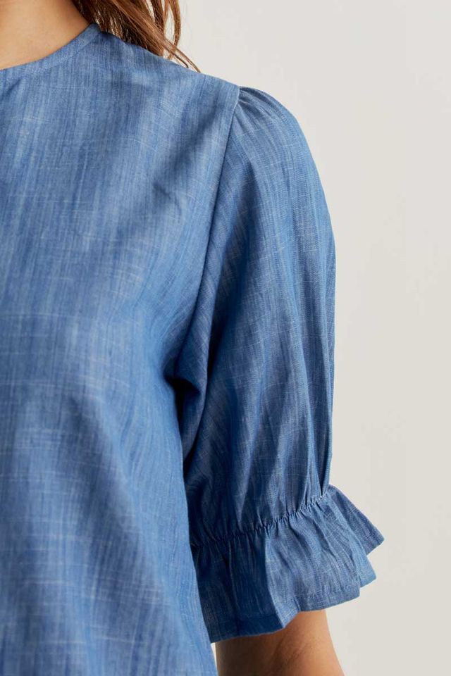 Light blue chambray 100% cotton shirt.