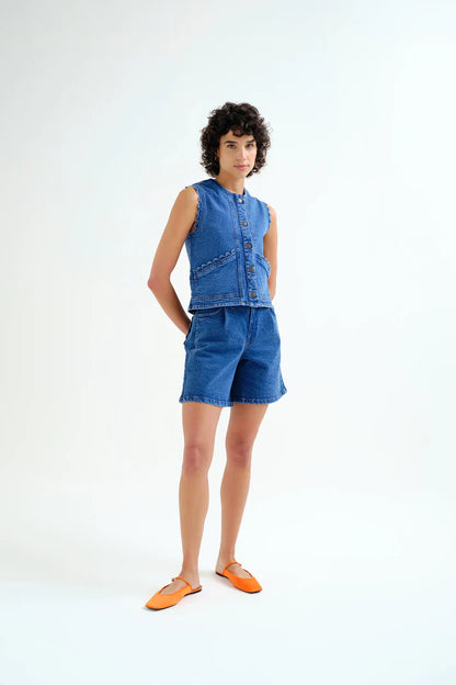 Blue denim vest with wavy detail