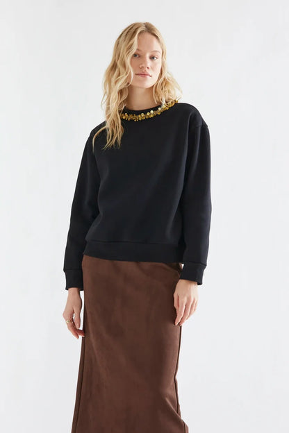 Black sweatshirt with golden jewel neck