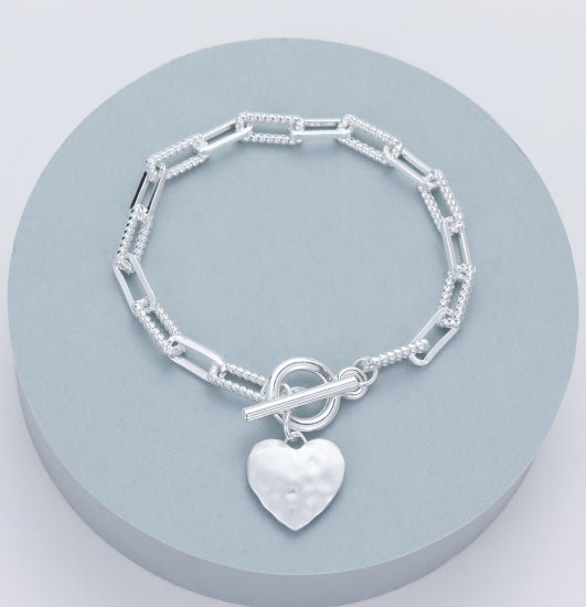 Ula Silver Bracelet with Textured Links and Heart charm