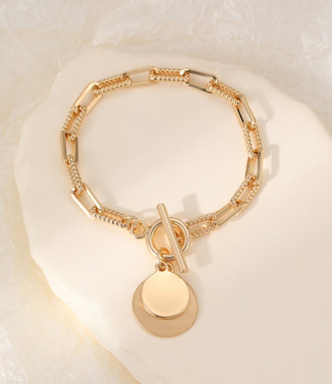 Gigi Chain Bracelet with Bar Fastening and Disc Charms in Gold